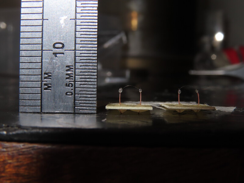 13 um vibrating wires (bolometer heaters)