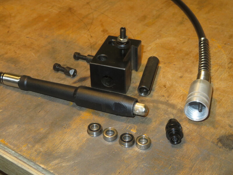 parts: dremel extension, bearings, toolholder